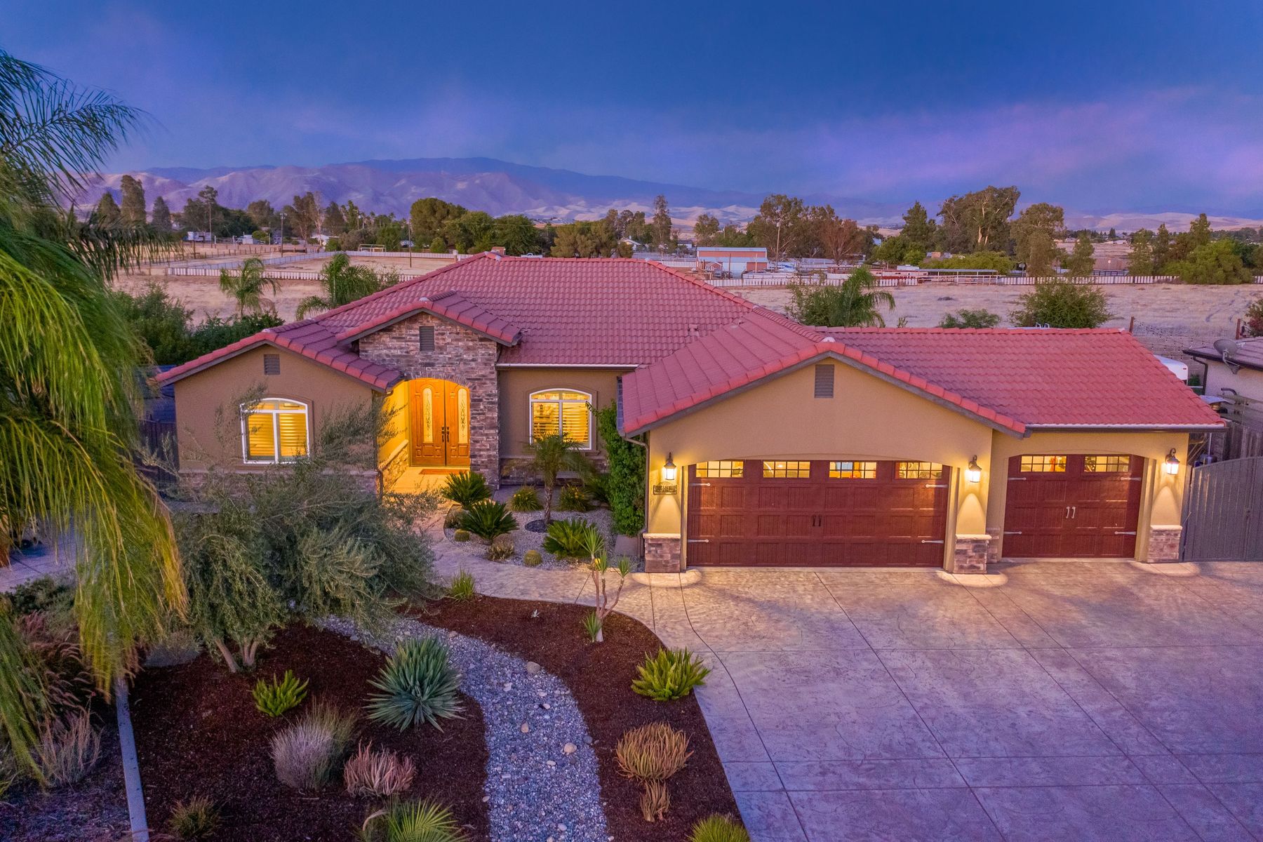 Twilight drone exterior with mountain views